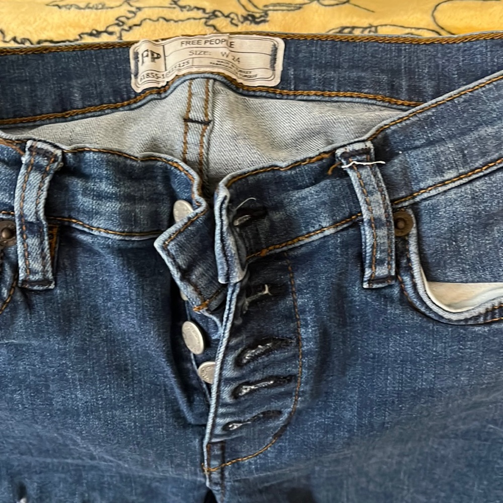 Denim jeans with some rips in em!